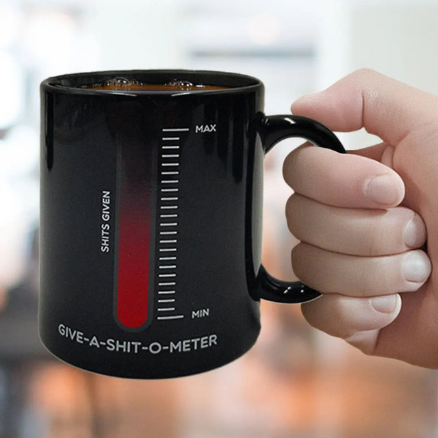 Tasse Give a Shit mit Farbwechsel durch Wärme von Mad Monkey