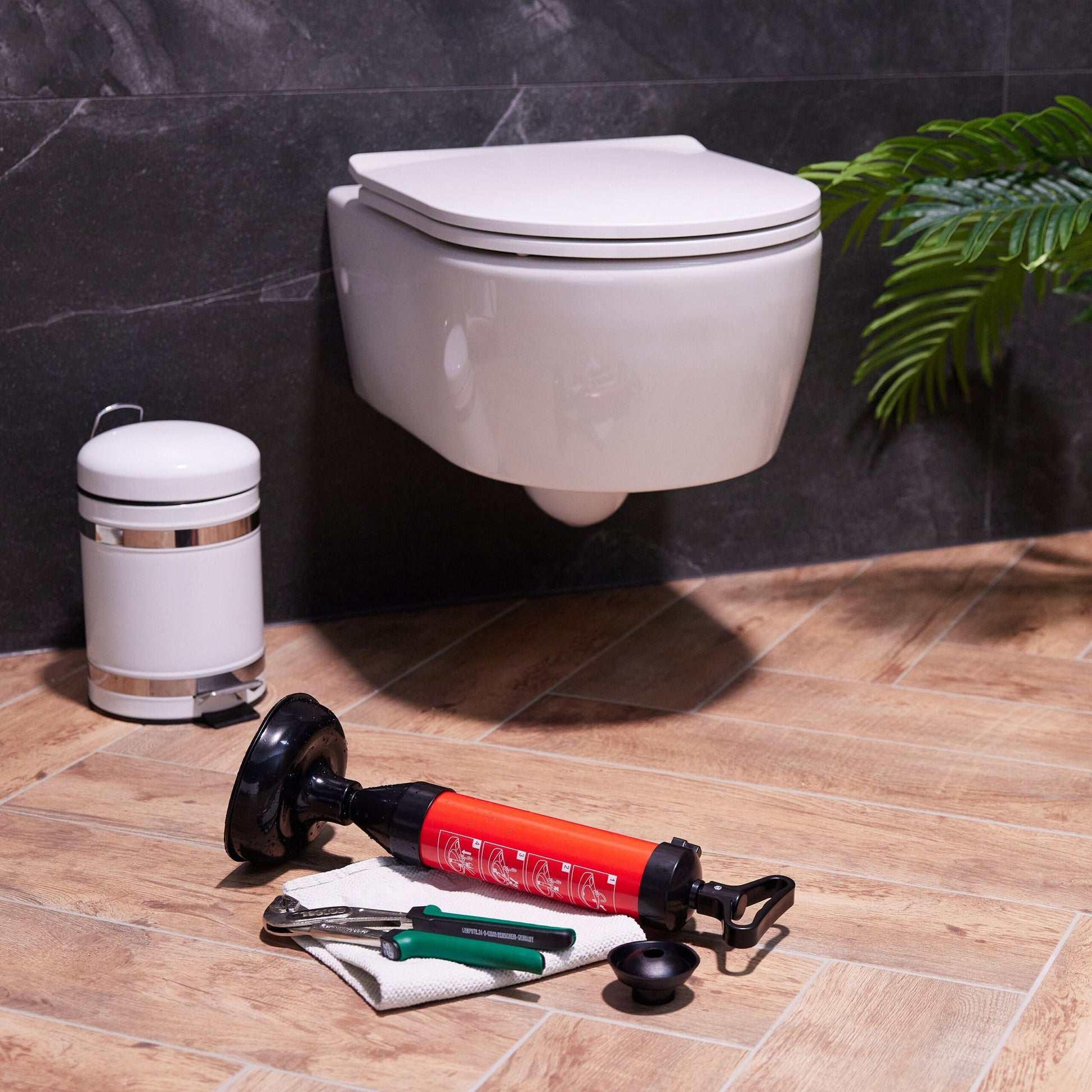 Abflussreiniger Pumpe Rot-Schwarz von Relaxdays