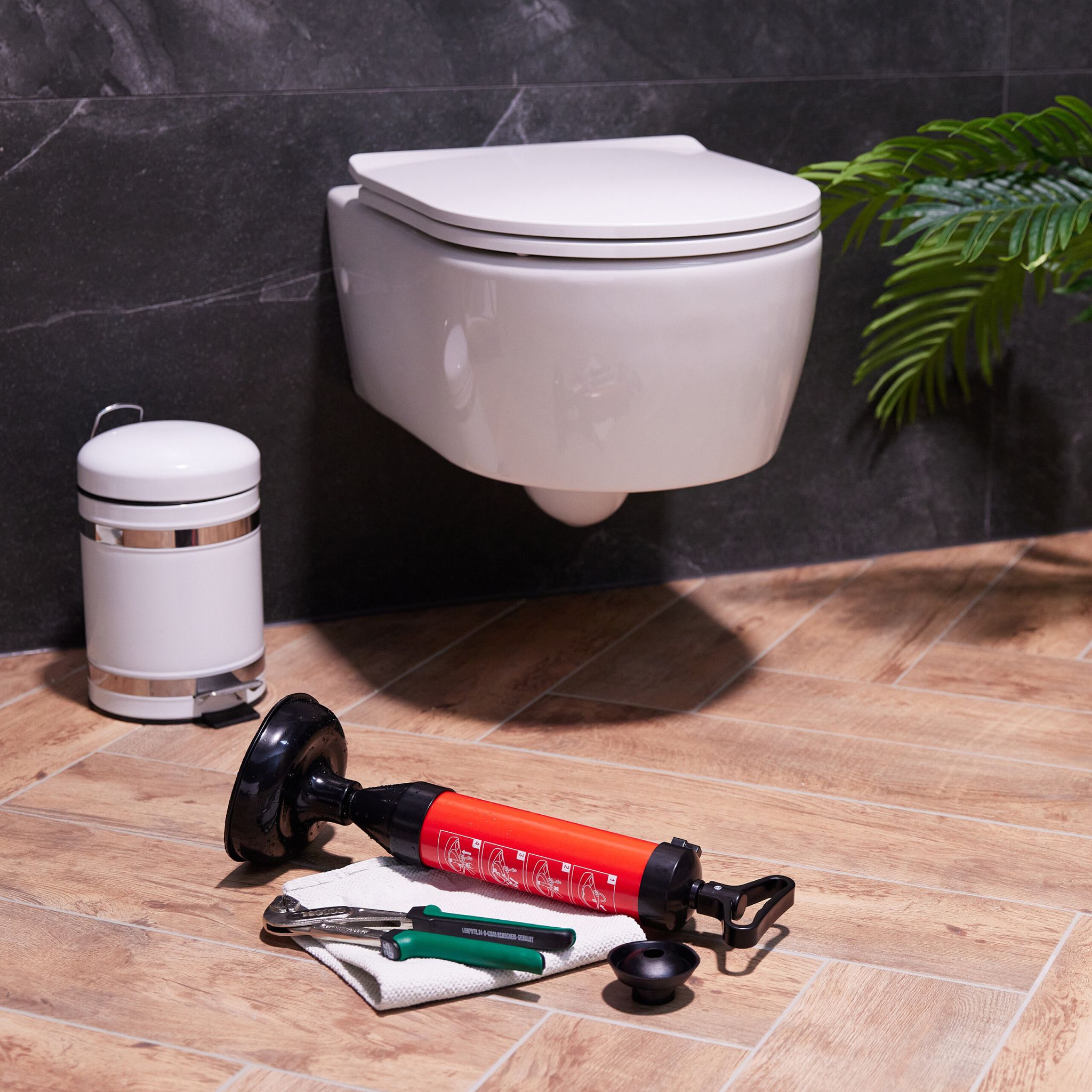 Abflussreiniger Pumpe Rot-Schwarz von Relaxdays